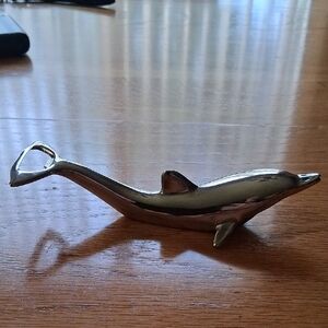 Sleek Silver Dolphin Bottle Opener